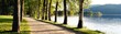 © Sansern - Lakeside trail walk serene nature calm environment scenic view