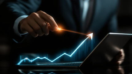 Poster - Businessman using digital technology projection on a tablet is raising a business graph with his finger