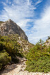 © Eugene Ga - Trail to Cala Goloritze beach in Sardinia. Cliffs and blue sky. Hiking trail in the Baunei area at the Gulf of Orosei in Sardinia, Italy.