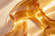 Beauty transparent moisturizing hydration hyaluronic acid gel serum texture detail close up make-up and cosmetics theme. Skin care product concept background golden color.