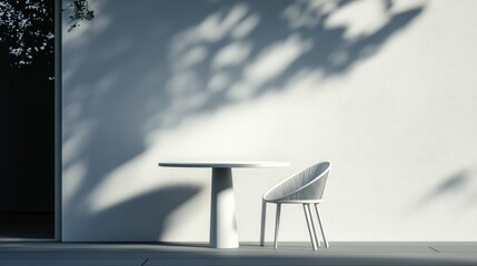 Poster - Minimalist white table and chair with soft shadows against a light wall creating a serene outdoor dining atmosphere.