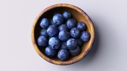 Aufkleber - Fresh blueberries in a round wooden bowl arranged aesthetically against a light background for a vibrant and natural food presentation.