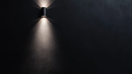 Poster - Elegant minimalist wall lamp casting soft light on a dark monochrome textured wall for modern interior decor inspiration