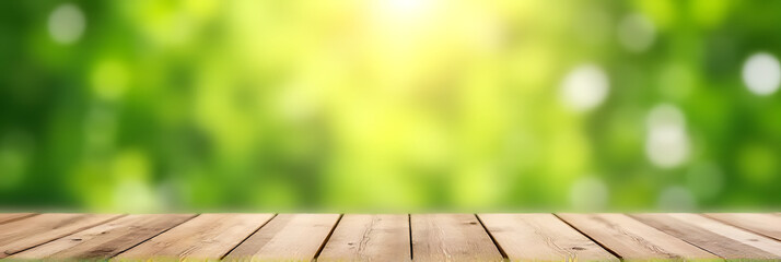 Aufkleber - The wooden tabletop is empty except for a blurred image of a vibrant green abstract floral arrangement with sunlight in the background._00003_