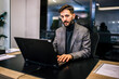 © Mediteraneo - Businessman sitting in his office and working on his computer.