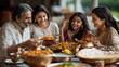 © DYAH - Happy family enjoying delicious meal together at a restaurant.