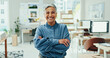 © peopleimages.com - Crossed arms, office and portrait of business woman with confidence, ambition and company pride. Startup, professional and happy mature person smile for architecture, design and creative career