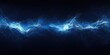 © Olena - Vibrant Blue Flames Dancing Against a Dark Canvas. Abstract Representation of Heat and Fire