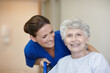 © peopleimages.com - Healthcare, nurse and senior woman in hospital, smile and happy for recovery, assisted living and joy. Sick, retirement and elderly person with disability, caregiver and help for patient in clinic