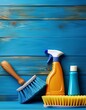 © swan - Cleaning supplies on blue wood background.  Bright, cheerful, and ready to clean!