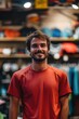 © Joyce - Portrait of a smiling happy friendly store employee in holiday shopping season
