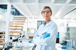 © Malambo20/peopleimages.com - Female person, scientist and ppe in portrait for medical research, innovation and phd in science lab. Mature woman, serious and confidence in pharmaceutical, chemistry and biotech with arms crossed