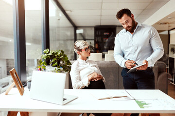 Poster - Pregnant woman, business people or man with tablet in office for company revenue, meeting or planning. Pregnancy schedule, hr manager or recruiter talking with teamwork, collaboration or technology