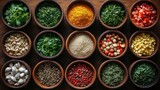Assorted spices and herbs in bowls.