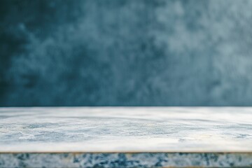 Poster - Smooth marble surface with a blurred blue background.