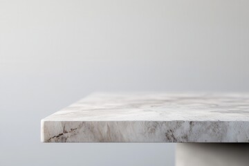 Poster - Close-up of a marble table edge against a soft background.