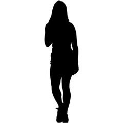 Wall Mural - A silhouette of a young woman walking