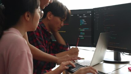 Fototapete - back end software developer engineer for computer programming working together on debugging writing 