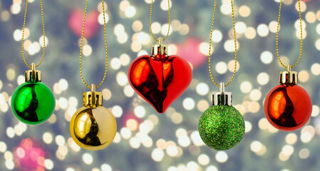 Wall Mural - Christmas bauble hanging decoration with bokeh light background celebration holiday banner template