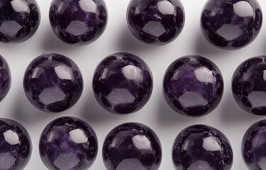 Leinwandbilder - A close-up view of polished purple spheres arranged in a grid pattern.