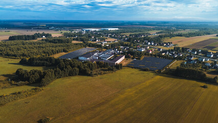 Wall Mural - Solar panels on factory in sunlight