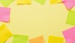 © Denis - Abstract sticky note background with vibrant yellow, pink, and green notes in random pattern