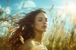 © YouraPechkin - Young woman enjoying a sunny day in a field of tall grass with flowing hair