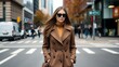 © velikiyzayats - Urban Elegance: A Fashionable Woman in a Brown Coat on a City Street