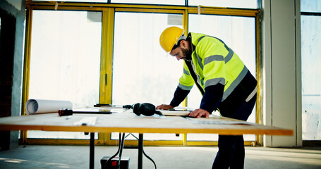 Poster - Architecture, inspection and blueprint with man on construction site for building, real estate and planning. Engineer, industrial and property developer with person for contractor and renovation