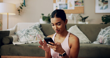 Aufkleber - Phone, fitness and woman on internet in home for health tips, scroll message and reading sports blog. Mobile, relax and Indian girl in living room for chat app, communication and check social media