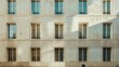 © D - Elegant Parisian architecture, modern minimalist building, full wall with windows and doors, warm sunlight, serene urban scene, no people present.