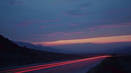 Poster - A car zooms past leaving a trail of light as it disappears into the distant horizon.