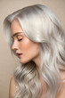 © anzodesign - Close up of radiant silver hair with a pearlescent shine under soft lighting