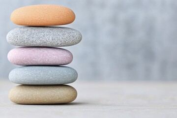Poster - Stack of healing stones balancing on each other symbolizing energy alignment