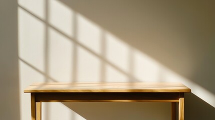 Poster - Sunlight Illuminates Minimalist Wooden Table Against Wall