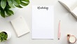 © Marina - Stylish notepad and planner on a minimalist desk with a pencil and a plant for organization
