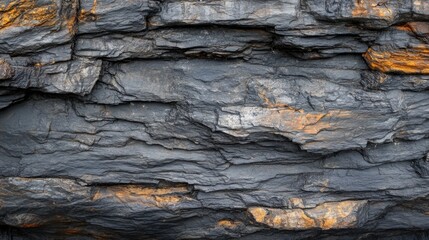 Poster - textured dark slate rock surface with orange highlights and layers