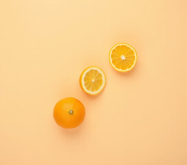 Aufkleber - A top view of orange fruit on a pastel background showcases healthy eating concepts and ideas for fruit and vegetables._00002_