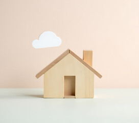 Poster - A miniature wooden house model is placed against a soft pastel colored background featuring a subtle tax icon in the sky._00002_
