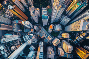 Canvas Print - Aerial view of a dense urban landscape with skyscrapers and city streets.