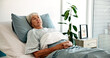 © peopleimages.com - Healthcare, recovery and thinking with old woman in hospital for medical treatment or wellness. Healing, idea and medicine with senior patient in bed at clinic for comfort, medicare or rehabilitation