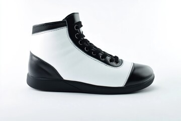Poster - A pair of black and white shoes on a clean white surface, great for close-up photography or as a prop in various settings