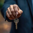 © Alla - A person holding a bunch of keys in their hand, possibly for unlocking or organizing purposes