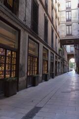 Wall Mural - a narrow street between houses in the old quarter of the city