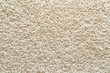 © Sandris Veveris - Soft Beige Shaggy Carpet Texture Closeup