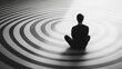 © Bonsales - Businessman is meditating at the center of a giant circular graph etched on a smooth white floor, in a wide-angle minimalist black and white photo