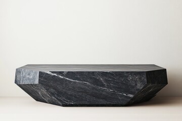 Poster - Black marble geometric platform on beige floor against white wall.