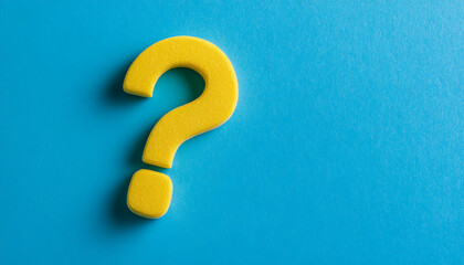 Poster - Bright yellow question mark on vibrant blue background symbolizes curiosity and inquiry in colorful design