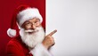 © Benny Yuniarto - Smiling Santa Claus pointing on blank advertisement banner background with copy space
