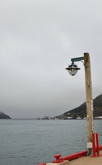 Wall Mural - lantern on the pier by the bay